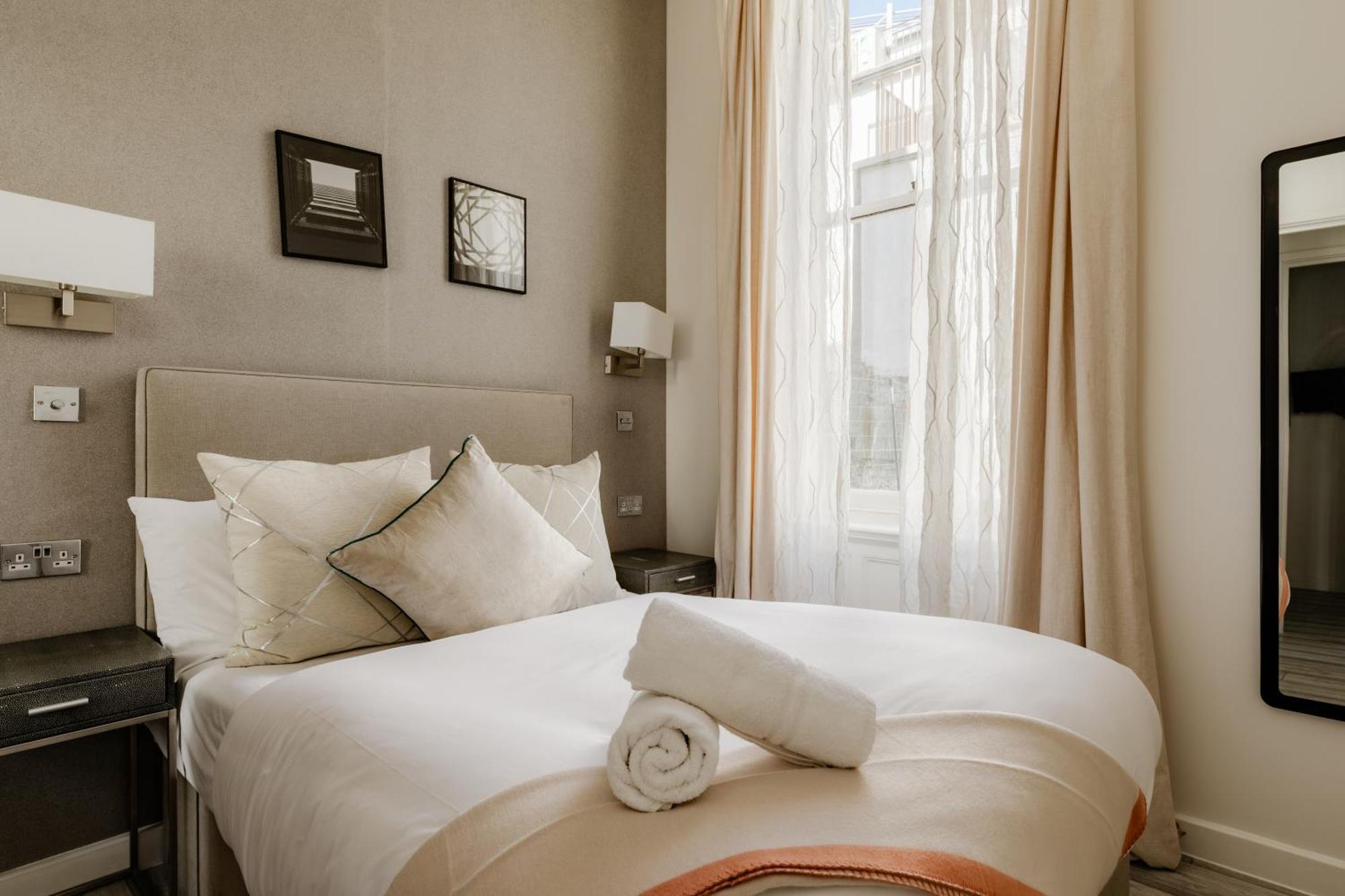 Апартаменты High Street Kensington *